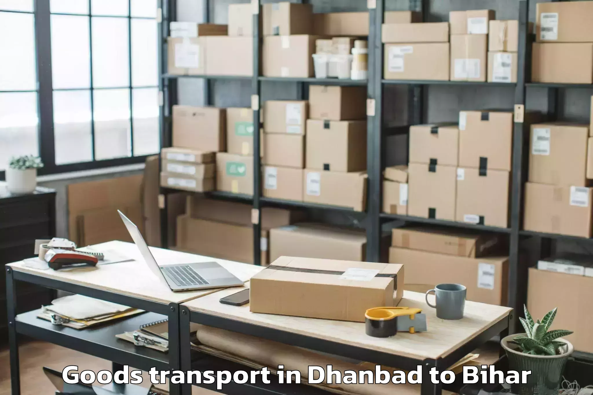 Book Dhanbad to Parwalpur Goods Transport